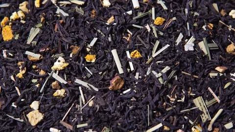Rotating tea leaves with the addition of dry citrus Stock Footage 101178601