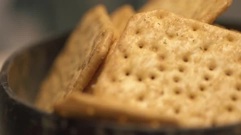 Rotating texture of Movin cracker with salt in a plate close-up. Stock Footage 146279877