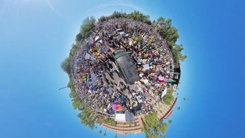 Rotating Tiny Planet 360 View of Protest Crowd in Phoenix Video stock 320551482