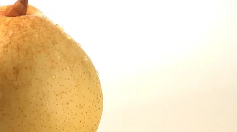 Rotating top portion of yellow pear Stock Footage 46585582