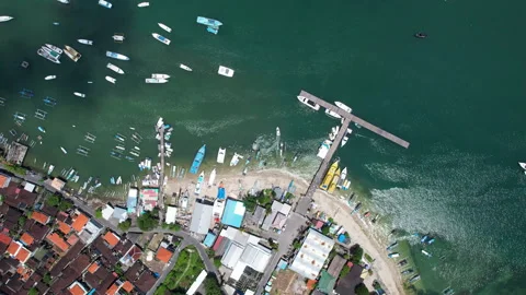 Rotating top view aerial shot of Serangan port on sunny day. Denpasar, Bali,  Stock Footage 285100484