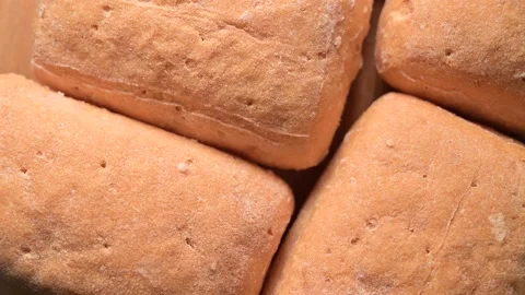Rotating top view of frozen bread Stock Footage 141618197