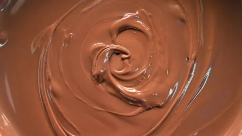 Rotating top view of hazelnut cream chocolate 스톡 동영상 142029276