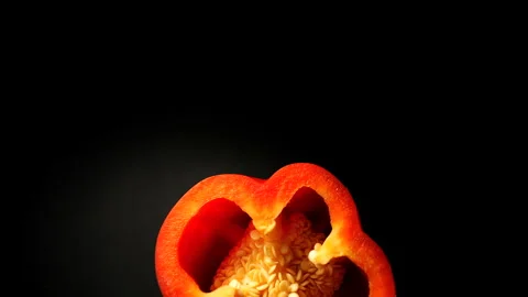 Rotating Top View of Sliced Red Pepper made in macro in 50p Stock Footage 337643672