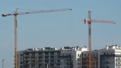 Rotating tower crane construction works building Stock Footage 100346648