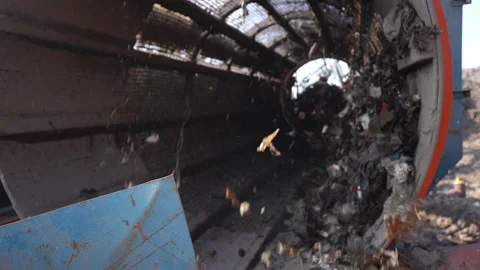Rotating Trommel Screen Separating Waste At Delhi Landfill Recycling Plant Stock Footage 248058655