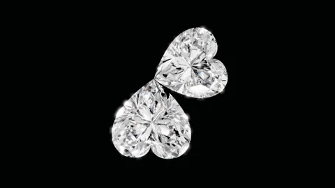 Rotating two heart shape diamonds on black , loop animation Stock Footage 318986254