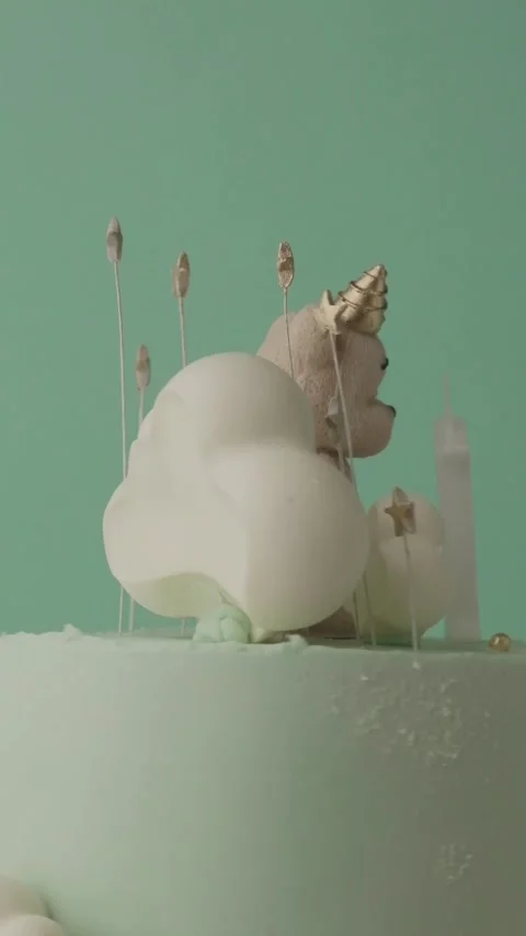 Rotating two tier birthday cake for a little kid Stock Footage 277990122