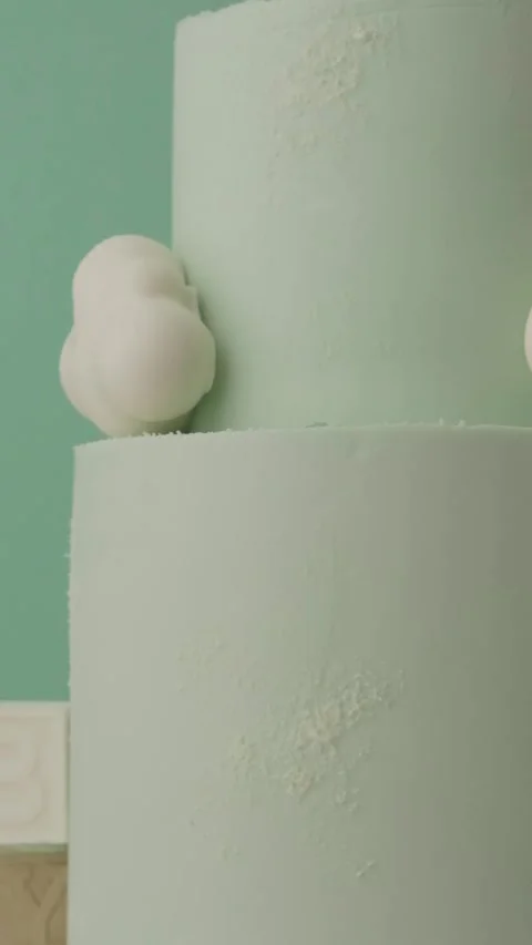 Rotating two tier birthday cake for a little kid Stock Footage 277990134