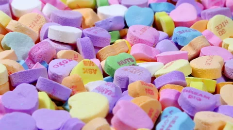 Rotating Valentine candy hearts Stock Footage 60655522