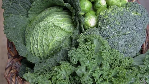 Rotating various green cabbages in basked  Seasonal Vegetables on daylight Stock Footage 81863555