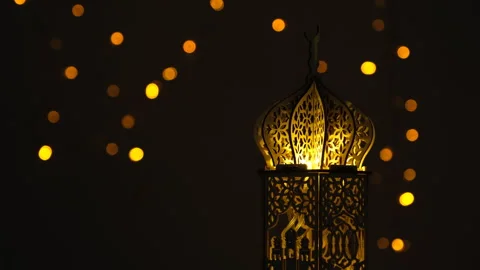 Rotating video of ornament mosque shape on bokeh background for Ramadan Stock Footage 296149779
