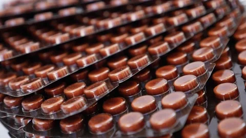 Rotating view of Bunch of brown colored packets Video stock 147699411