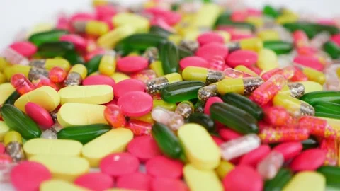 Rotating view of colorful tablets with white background Stock Footage 147700335