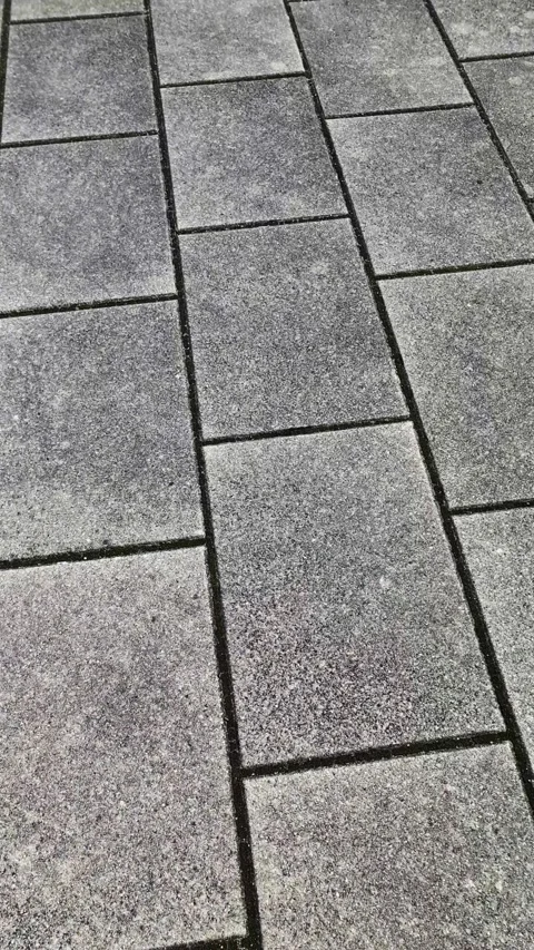 Rotating view of gray rectangular paving stones 스톡 동영상 315594815