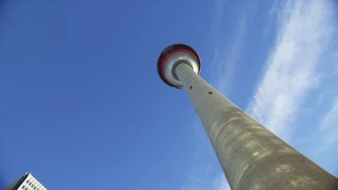 Rotating View Looking Up at Calgary Tower Against Clear Blue Sky Stock Footage 328300236
