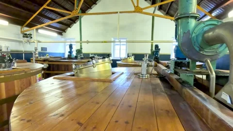 Rotating View of Whisky Fermentation Tanks in Distillery Interior Stock Footage 320924092