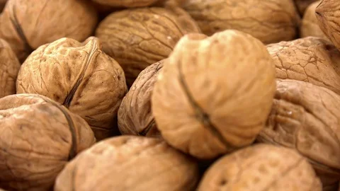 Rotating Walnuts (not loopable; 4K) Stock Footage 78076567