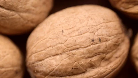 Rotating walnuts shot from above Stock Footage 119203231