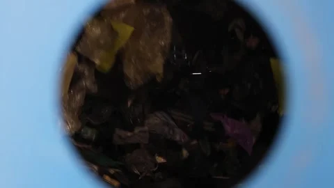 Rotating waste inside sorting drum in processing plant Stock Footage 334633510