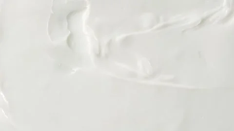 Rotating White Cream Texture  Top View Skincare Product Motion Stock Footage 317316687
