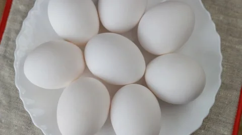 Rotating of white eggs , top view Stock Footage 60931508