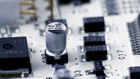 Rotating White Printed Circuit Board, Microprocessors, Capacitors and Audio Stock Footage 79222114