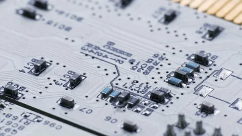 Rotating White Printed Circuit Board, Microprocessors, Capacitors and Audio Stock Footage 80669309