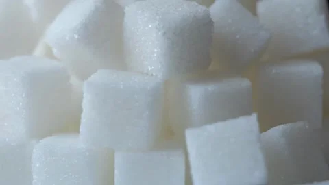 Rotating White Sugar Cubes Showing Unhealthy Eating and Sweetness Overload Stock Footage 323779205