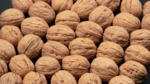 Rotating Whole Walnuts In Shell Macro Texture Background Stock Footage 332527389
