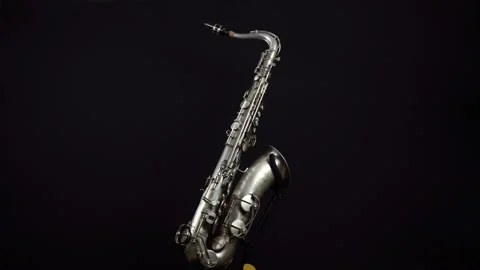 Rotating Wind Instrument Saxophone. Video stock 128456728