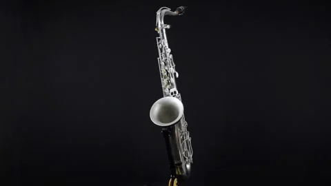 Rotating Wind Musical Instrument On A Black Background. Video stock 246730360