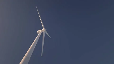 Rotating wind power machine as renewable alternate green energy - endless loop Stock Footage 250965011