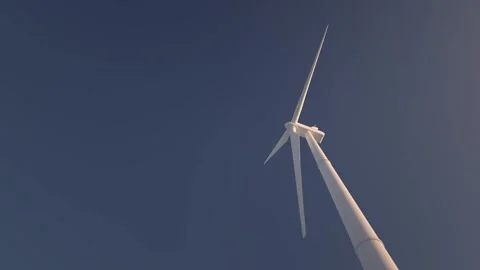 Rotating wind power machine as renewable alternate green energy windmill - loop Stock Footage 250965434