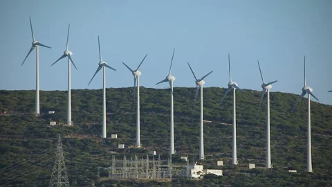 Rotating wind turbines and power plant. Stock Footage 247641737