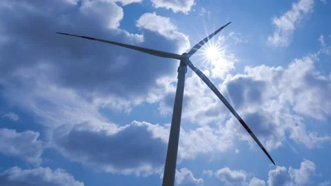 Rotating wind wheel against the background on the sky and the movement of the Stock Footage 166576752
