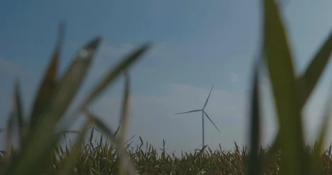 Rotating Windmill On A Background Of Blue Sky And Green Grass. Wind Power Stock Footage 123690224