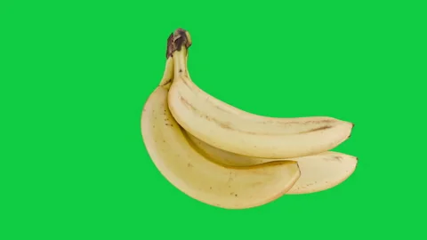 Rotating Yellow Banana with Stem Isolated on Green Screen. Fruit food loop Stock Footage 339818265