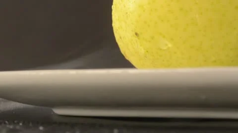 Rotating Yellow Pear - Crane Up Video stock 22024282