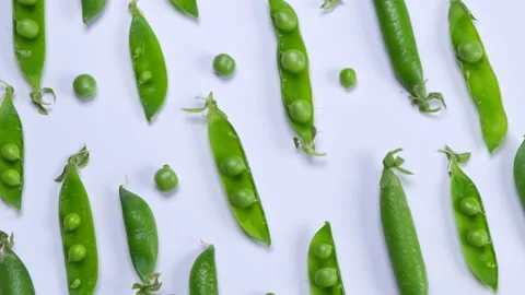 Rotating young green peas on white background, healthy food concept, trendy Stock Footage 197484137