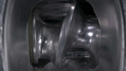 The rotation of the auger in a meat grinder, which pushes the meat forward to Stock Footage 117174456