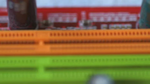 Rotation of a bright red board with chips and microcircuits in slow motion Stock Footage 151247233
