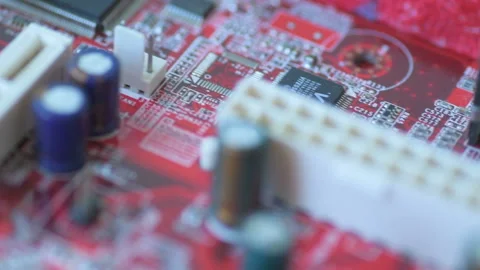 Rotation of a bright red board with chips and microcircuits in slow motion Stock Footage 151254685