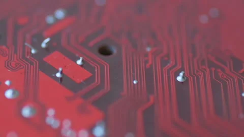 Rotation of a bright red board with chips and microcircuits in slow motion Video stock 151255324