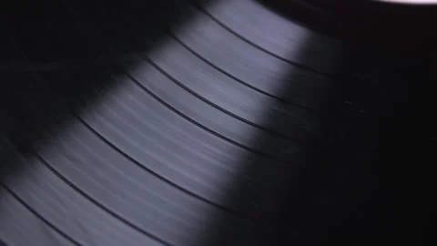 Rotation of broken vinyl disk in player closeup Stock Footage 279944660