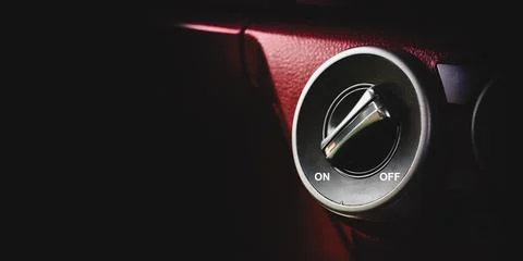 Rotation button switch on dashboard, on off switch, copy space Stock Photos