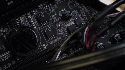 Rotation camera inside the computer; lithium battery, cables, microchip Stock Footage 106644036