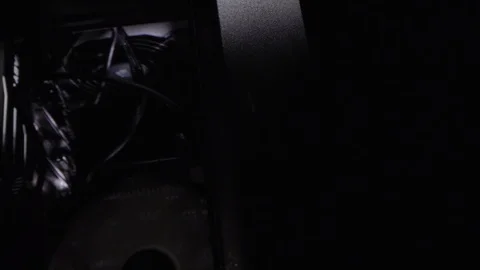 Rotation camera inside the computer through fan and cables. Close up Video stock 106647360