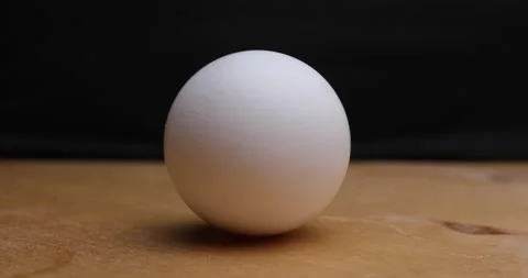 Rotation of chicken egg Stock Footage 156859410