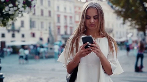 Rotation close up view of attractive young woman in stylish white blouse Stock Footage 112673510